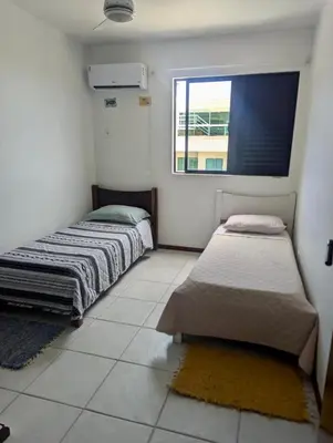 Uma cama ou camas num quarto em Apartamento vista para o mar - Praia do Mariscal