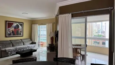 Uma área de estar em Apartamento com 3 quartos em Meia Praia - Itapema - SC