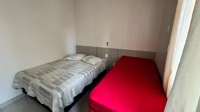 Uma cama ou camas num quarto em Apartamento com 3 quartos em Meia Praia - Itapema - SC