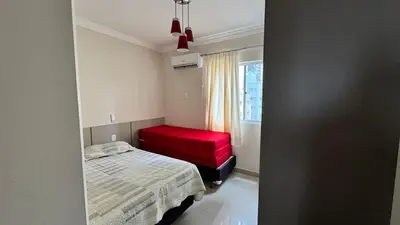 Uma cama ou camas num quarto em Apartamento com 3 quartos em Meia Praia - Itapema - SC