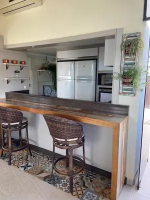 A cozinha ou kitchenette de Cobertura com piscina e vista do mar