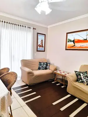 Uma área de estar em Apartamento do Sol - 2 quartos, completo, 300m da praia