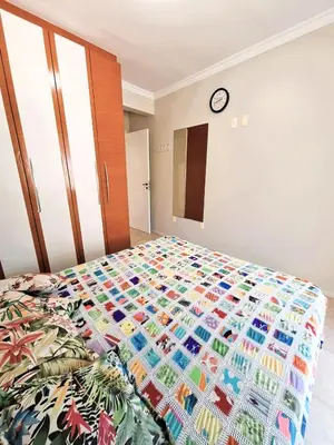 Uma cama ou camas num quarto em Apartamento do Sol - 2 quartos, completo, 300m da praia