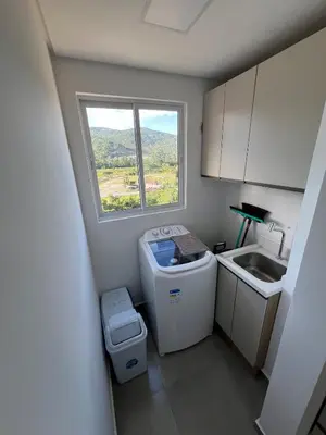 A cozinha ou kitchenette de Apartamento novinho poucos minutos da praia