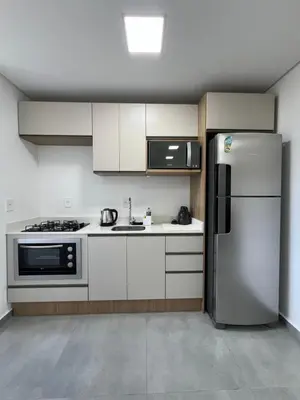 A cozinha ou kitchenette de Apartamento novinho poucos minutos da praia