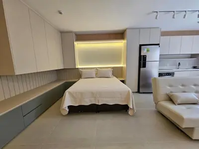 Uma cama ou camas num quarto em Flat aconchegante