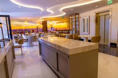 Um restaurante ou outro lugar para comer em Apto 1801 Frente mar, 200m da Praia, Restaurantes e Hard Rock Café
