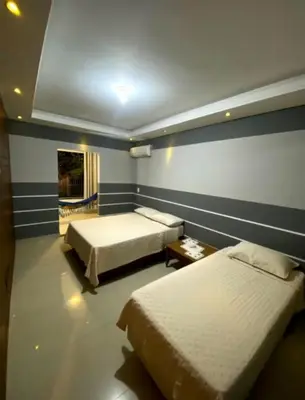 Uma cama ou camas num quarto em Casa Flores TÉRREA