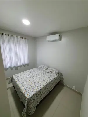 Uma cama ou camas num quarto em Casa Flores TÉRREA