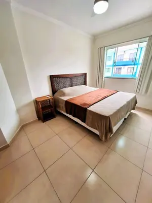 Uma cama ou camas num quarto em Apartamento do Sol - Cobertura Piscina privativa, 4 quartos, 220m da praia no centro de Bombinhas