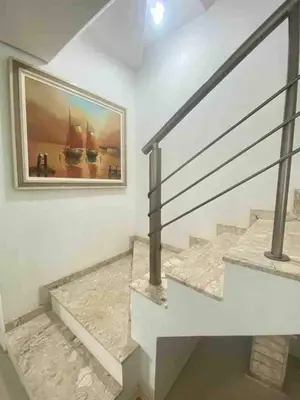 Uma cama ou camas num quarto em Casa com piscina a 400m da praia de Palmas