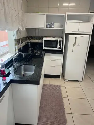 A cozinha ou kitchenette de Ap com um dormitório 30m da praia de Mariscal