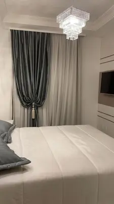 Uma cama ou camas num quarto em Apartamento 3 suítes rua 226 na Meia Praia