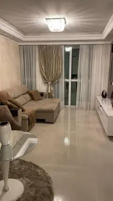 Uma área de estar em Apartamento 3 suítes rua 226 na Meia Praia