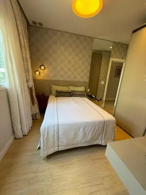 Uma cama ou camas num quarto em Apartamento rua 315 com 3 suítes próximo ao Píer