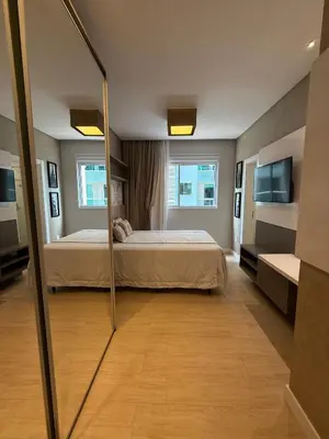 Uma cama ou camas num quarto em Apartamento rua 315 com 3 suítes próximo ao Píer