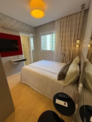 Uma cama ou camas num quarto em Apartamento rua 315 com 3 suítes próximo ao Píer