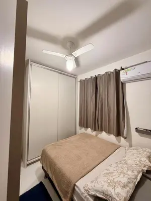 Uma cama ou camas num quarto em Um Lar - Acolhedor, Pronto para Receber Você