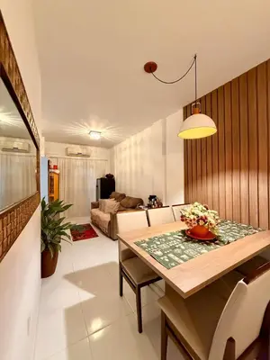Uma área de estar em Um Lar - Acolhedor, Pronto para Receber Você