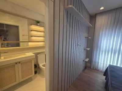 Uma casa de banho em Apê alto padrão 3 suítes com piscina e academia