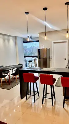 A cozinha ou kitchenette de 2 suítes, 2 garagens proximo ao HardRock Cafe Itapema