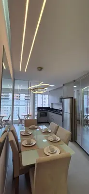 A cozinha ou kitchenette de Apartamento gran Vittória praia itapema sc