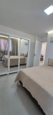 Uma cama ou camas num quarto em Apartamento gran Vittória praia itapema sc