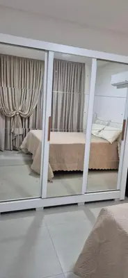 Uma cama ou camas num quarto em Apartamento gran Vittória praia itapema sc