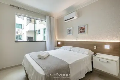 Uma cama ou camas num quarto em Aptos em Cond com Piscina e Academia próx da Praia - SBH