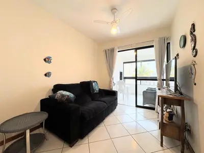 Uma televisão e/ou sistema de entretenimento em Seu Refúgio em Bombinhas Conforto e Vista do Mar