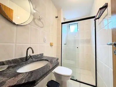 Uma casa de banho em Seu Refúgio em Bombinhas Conforto e Vista do Mar