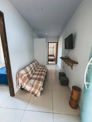 Uma cama ou camas num quarto em Apto 01 canto grande