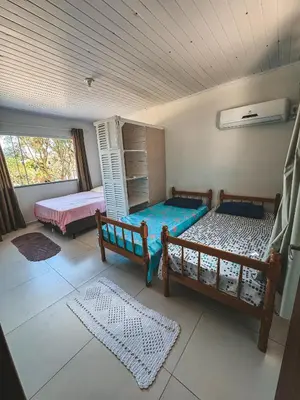 Uma cama ou camas num quarto em Apto 01 canto grande