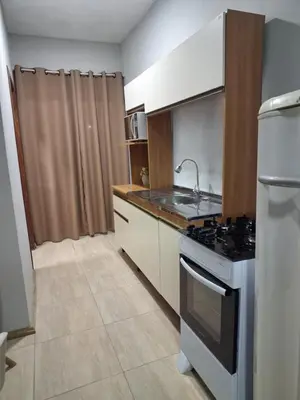 A cozinha ou kitchenette de Residencial Zimbros 02