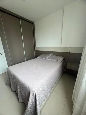 Uma cama ou camas num quarto em Aconchego