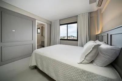 Uma cama ou camas num quarto em Triplex Exclusivo 3 Suítes em Bombas