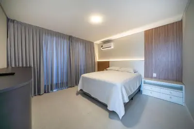 Uma cama ou camas num quarto em Triplex Exclusivo 3 Suítes em Bombas