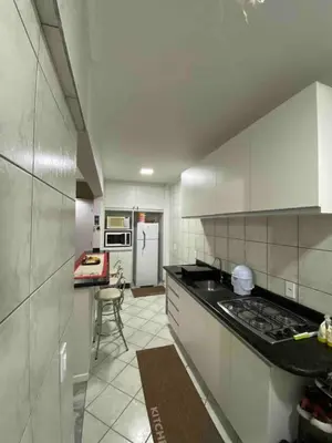 A cozinha ou kitchenette de Apartamento aconchegante em Bombas