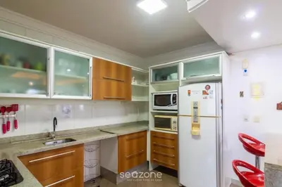 A cozinha ou kitchenette de Apto c/ suíte a 30m do mar em Itapema CAE0103