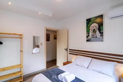 Uma cama ou camas num quarto em Apto c/ suíte a 30m do mar em Itapema CAE0103