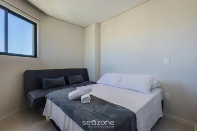 Uma cama ou camas num quarto em Aptos completos com localização privilegiada a 600m da Praia de Itapema – LPRs