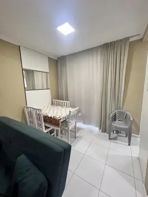 Uma área de estar em Apartamento à 300 metros praia - Centro - Itapema