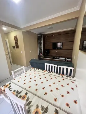 Uma televisão e/ou sistema de entretenimento em Apartamento à 300 metros praia - Centro - Itapema