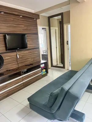 Uma televisão e/ou sistema de entretenimento em Apartamento à 300 metros praia - Centro - Itapema