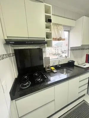 A cozinha ou kitchenette de Apartamento à 300 metros praia - Centro - Itapema