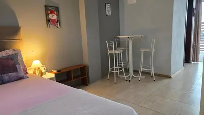 Uma cama ou camas num quarto em Residencial Zimbros 002