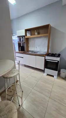 A cozinha ou kitchenette de Residencial Zimbros 002