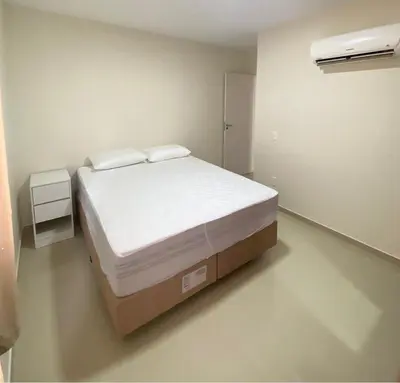 Uma cama ou camas num quarto em Departamento Bombas Brasil