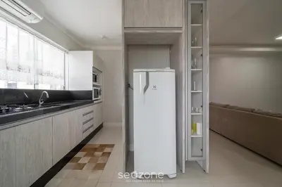 A cozinha ou kitchenette de Apto prox a praia e com churrasqueira IBL103