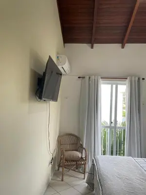Uma televisão e/ou sistema de entretenimento em Dúplex condominio en Mariscal